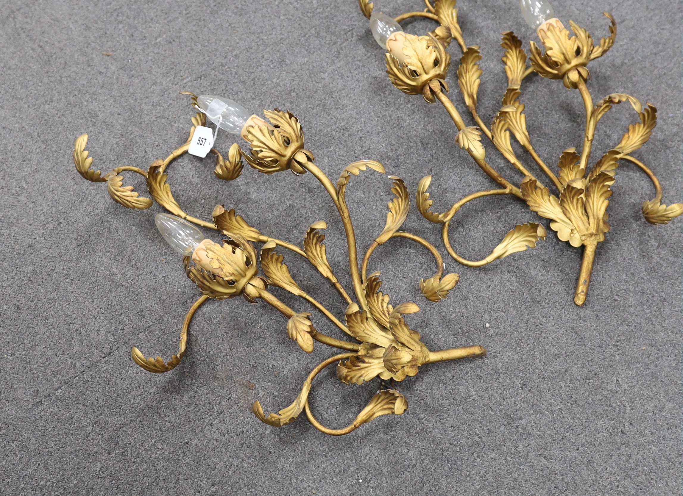 A pair two-light gilt twin branch wall sconces, 56cm high
